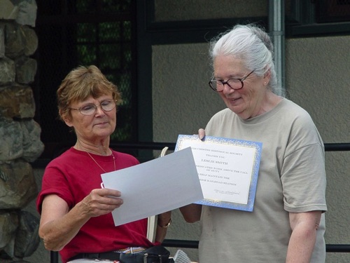 2008-06-14 Society Secretary, Norma presents award to Leslie, who handled most of the pricing throughout year in preparation of the annual yard sale. DSC04150a.jpg